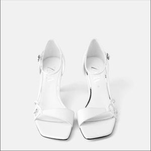 White leather with heels details sandals